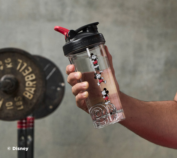 pro-series-c4 Mickey_Mouse_Protein_Shaker_Bottle_Being_Held_In_the_Gym.jpg